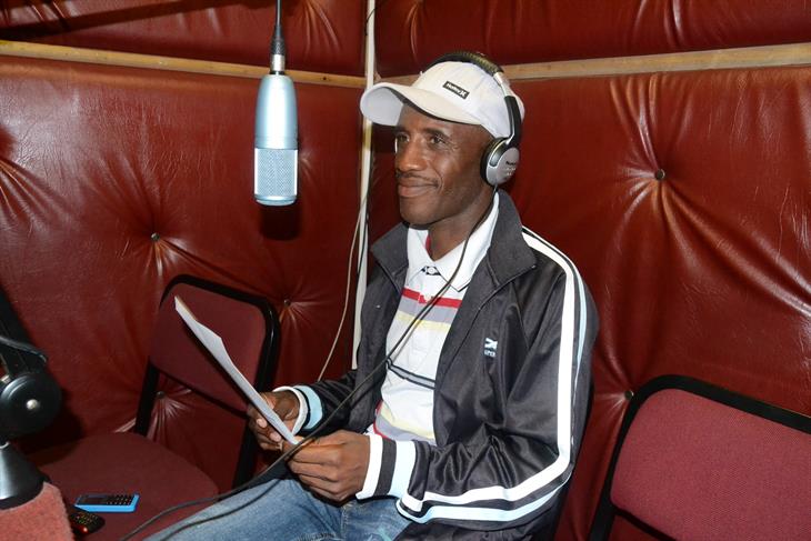 Mokhotsi behind the mic