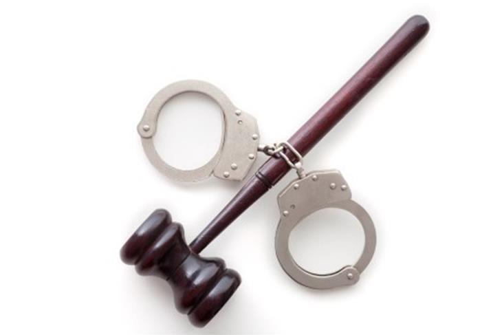 A WOMAN CHARGED WITH ARSON