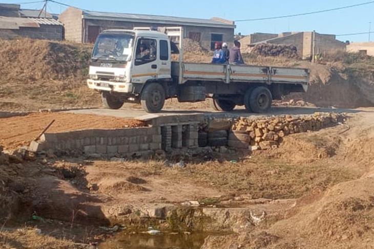 HA SHELILE COMMUNITY CONSTRUCT ROAD