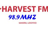 Harvest FM presents gifts to a 100 years old woman