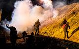 US authorities fire tear gas to migrants during the first hours of 2019.