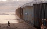 Sixteen states sue Trump over emergency wall declaration.