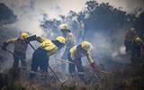 South Africans evacuates small coastal communities near Cape Town as wildfires burn out of control