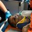 Venezuela quake survivor pulled out alive after eight days